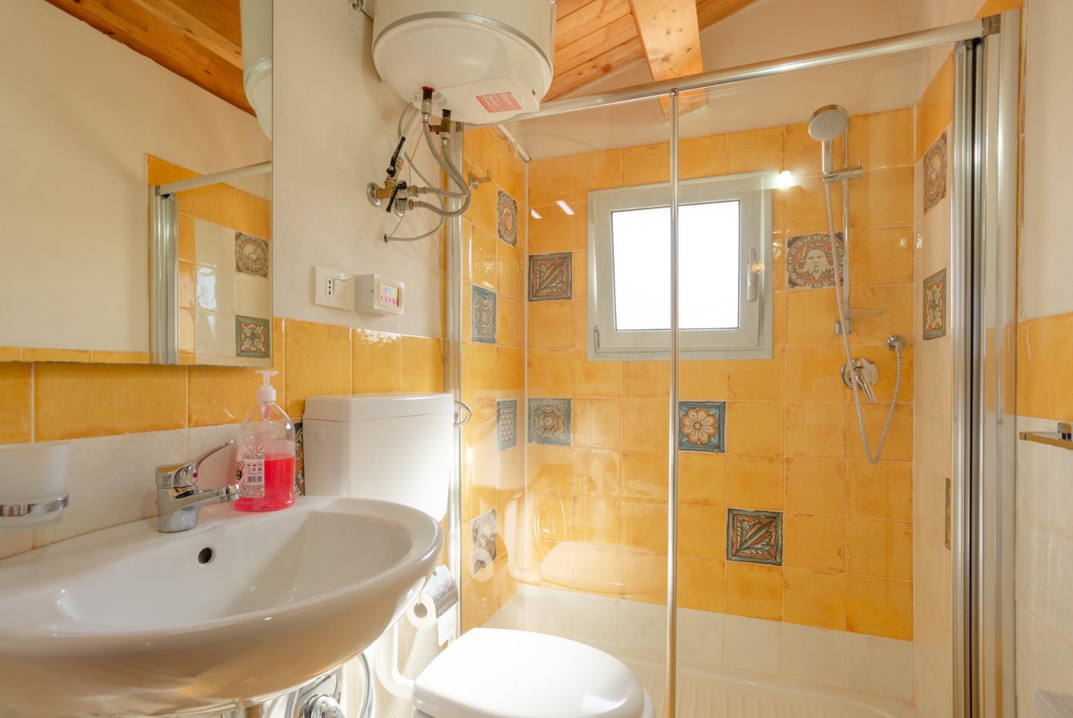 Family bathroom with shower on first floor of villa 
