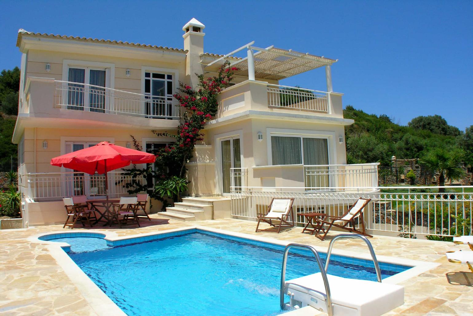 ,Beautiful villa with private pool, terrace, and lawn 