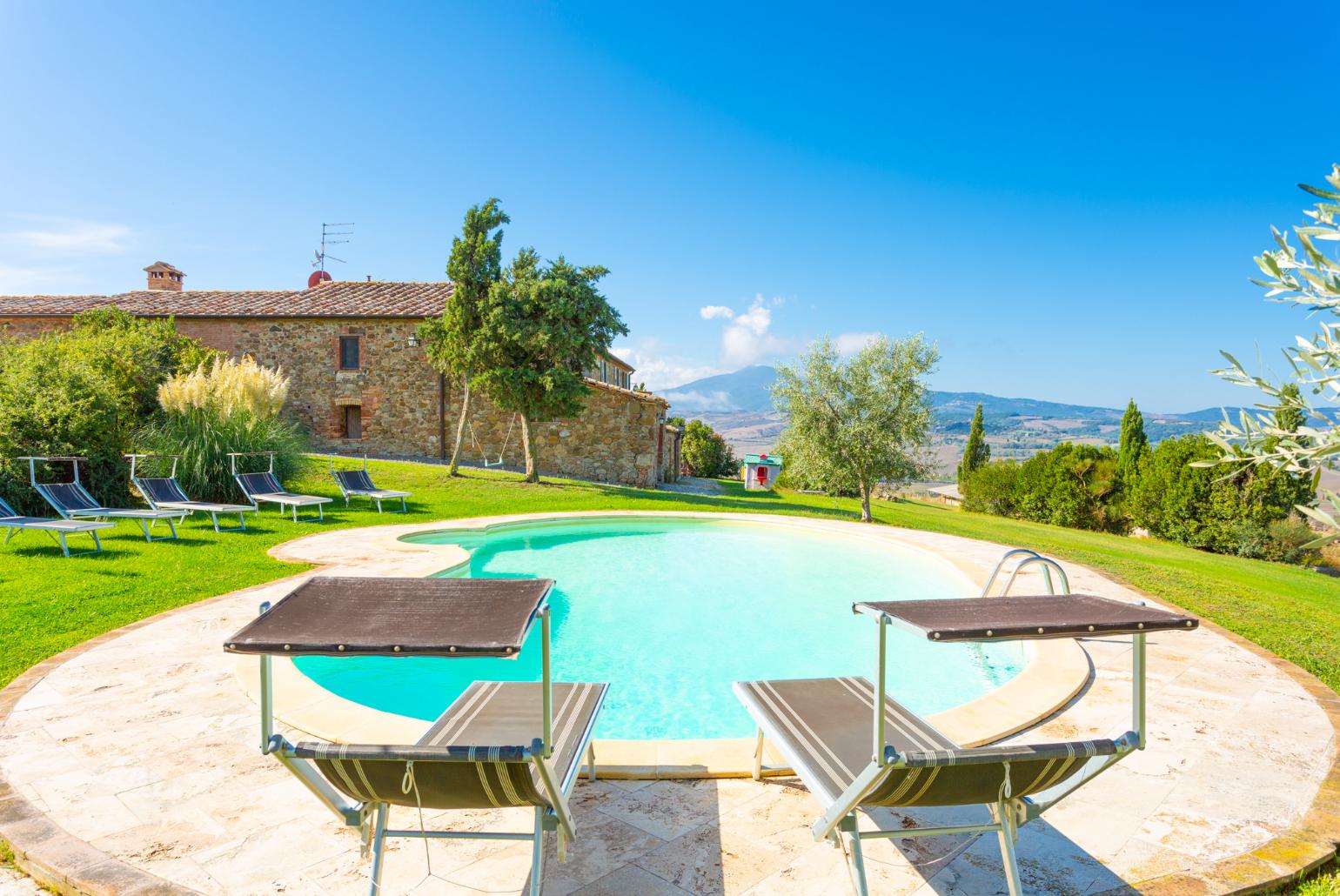 Beautiful villa with private pool, terrace, large lawn, and panoramic Tuscan views