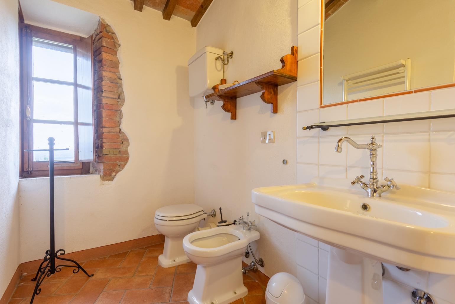 Family bathroom with bath and shower