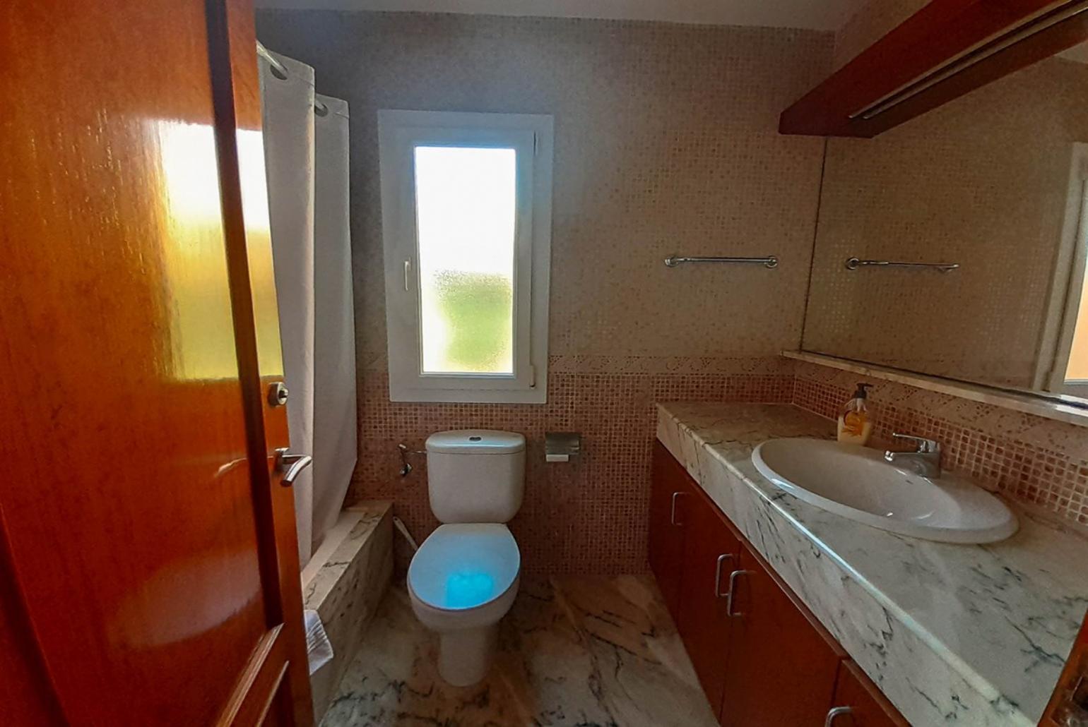 Family bathroom with shower. W/C.