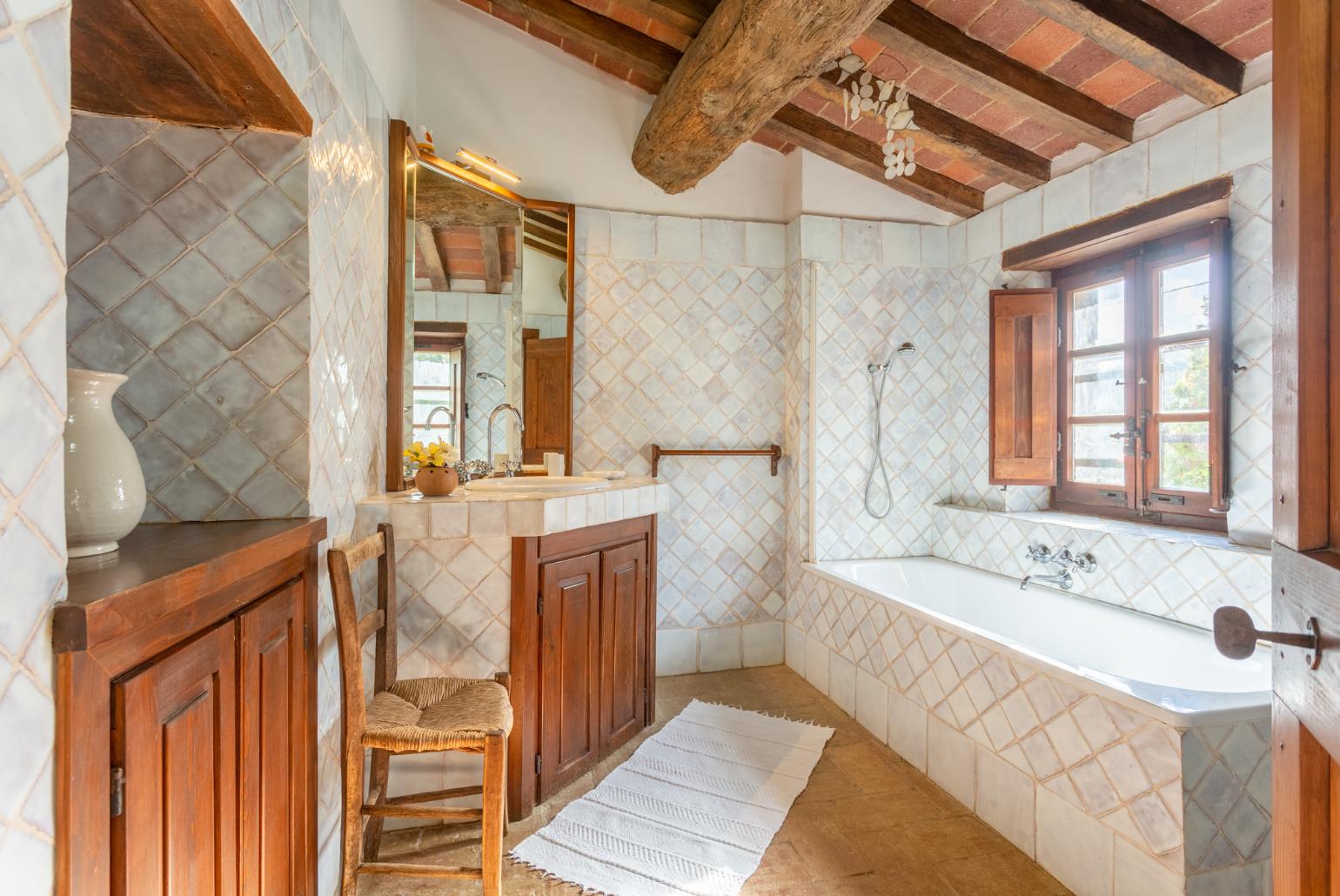 Family bathroom with bath and shower