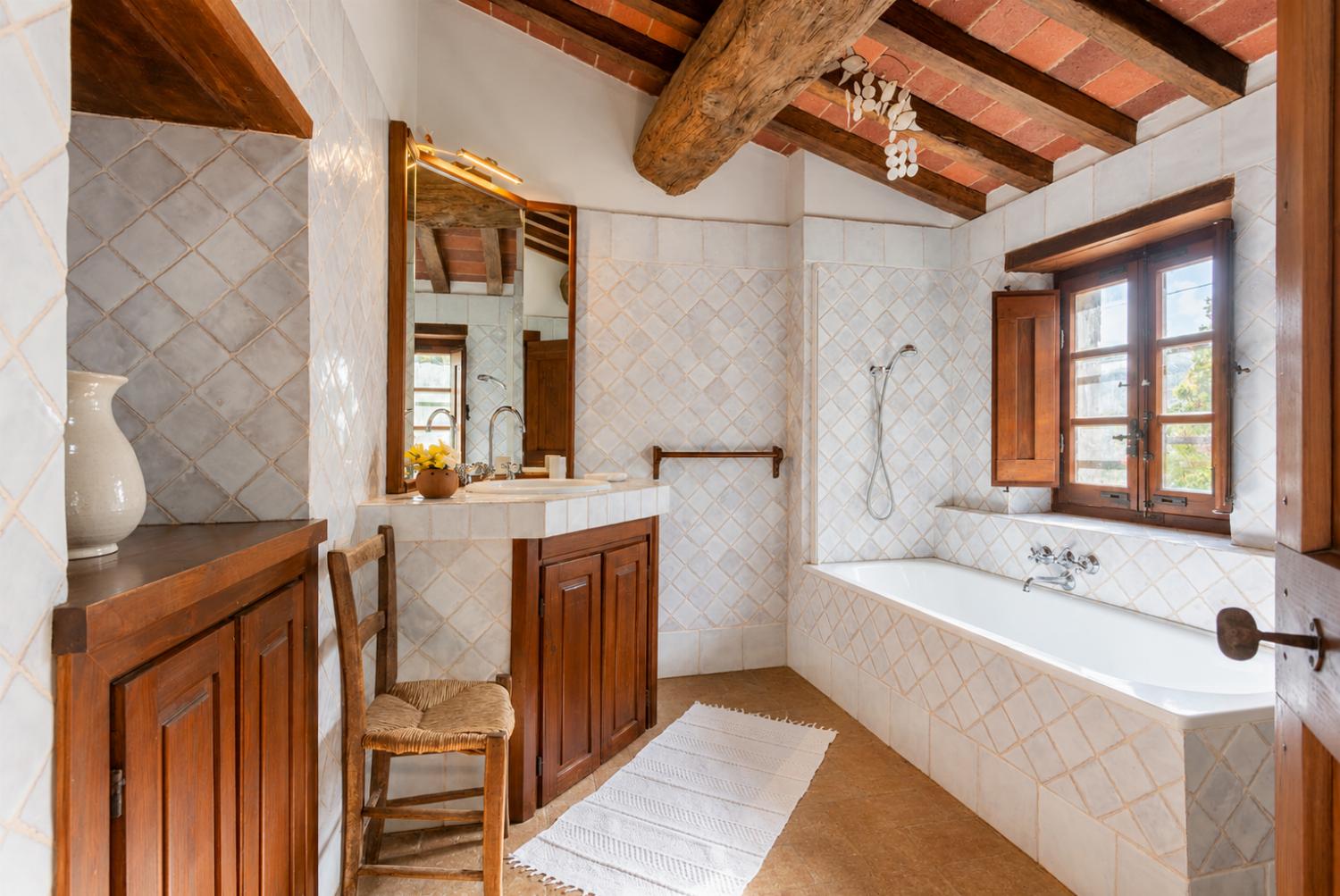 Family bathroom with bath and shower