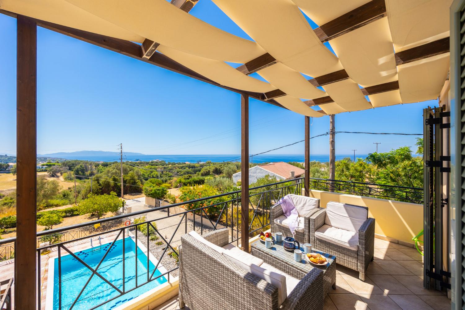 Upper terrace area with sea views