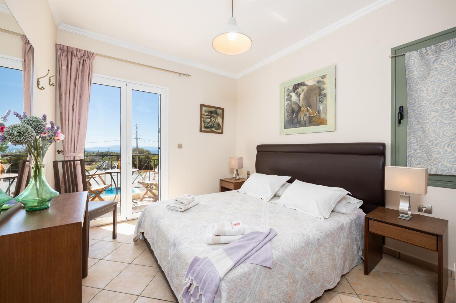 Double bedroom with en suite bathroom, A/C, and sea views