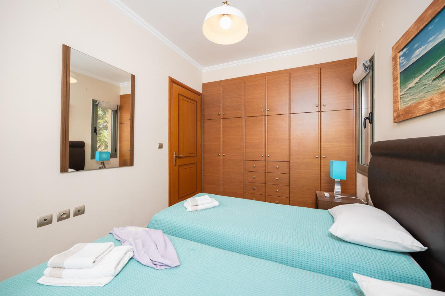 Twin bedroom with A/C