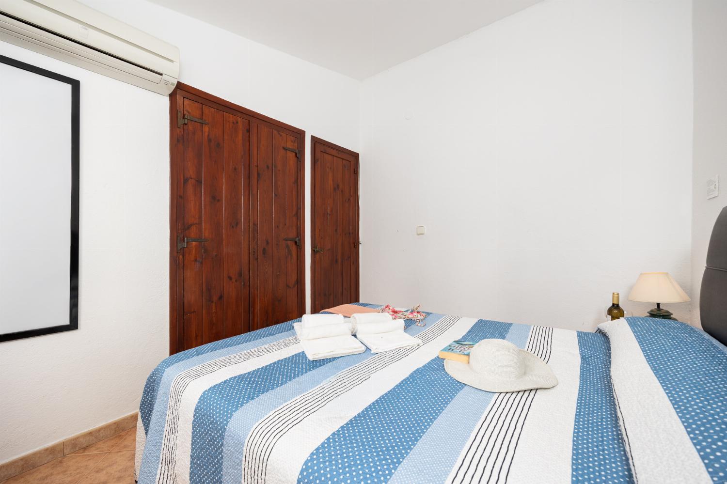 Double bedroom with en suite bathroom and A/C