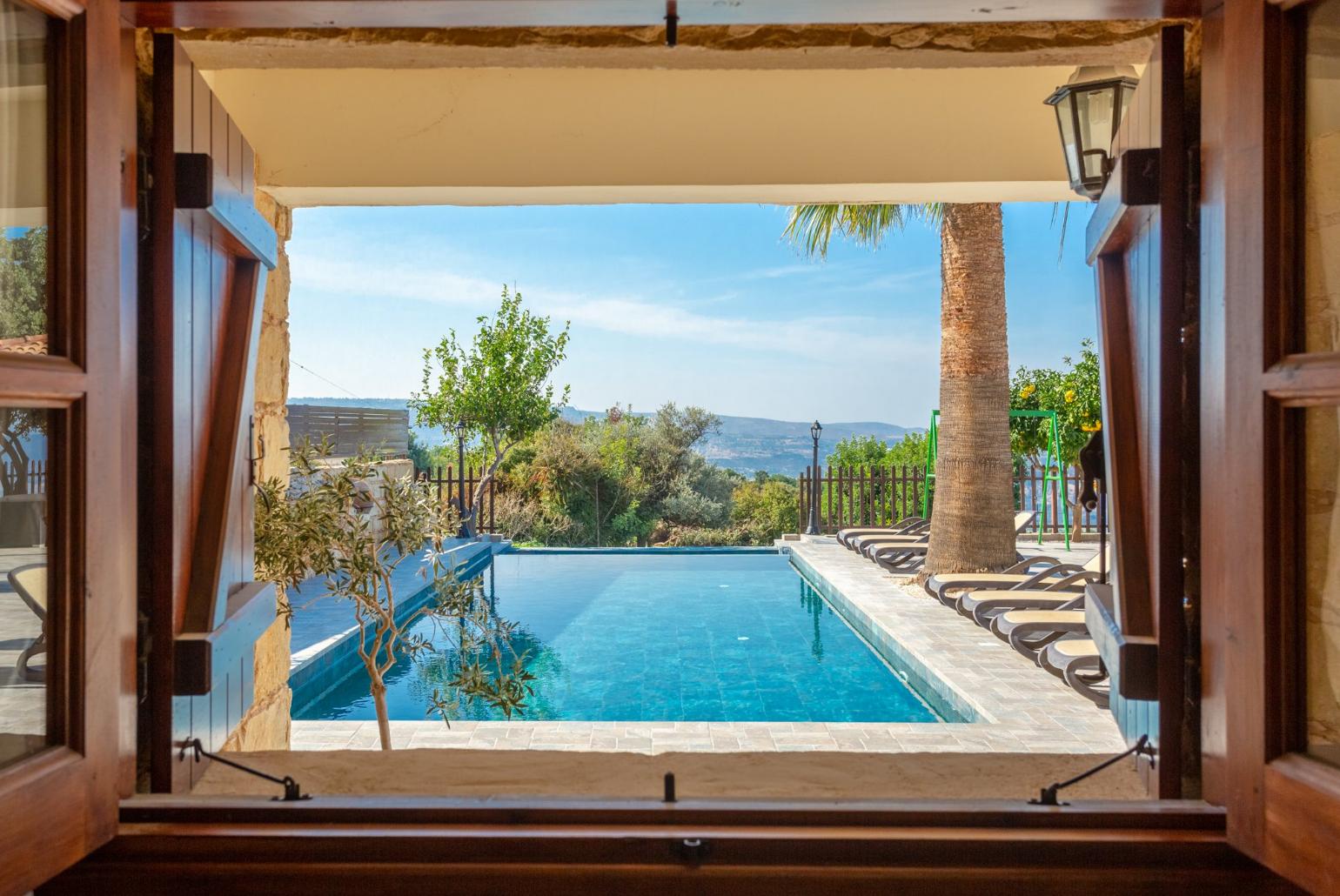 View of pool from kitchen