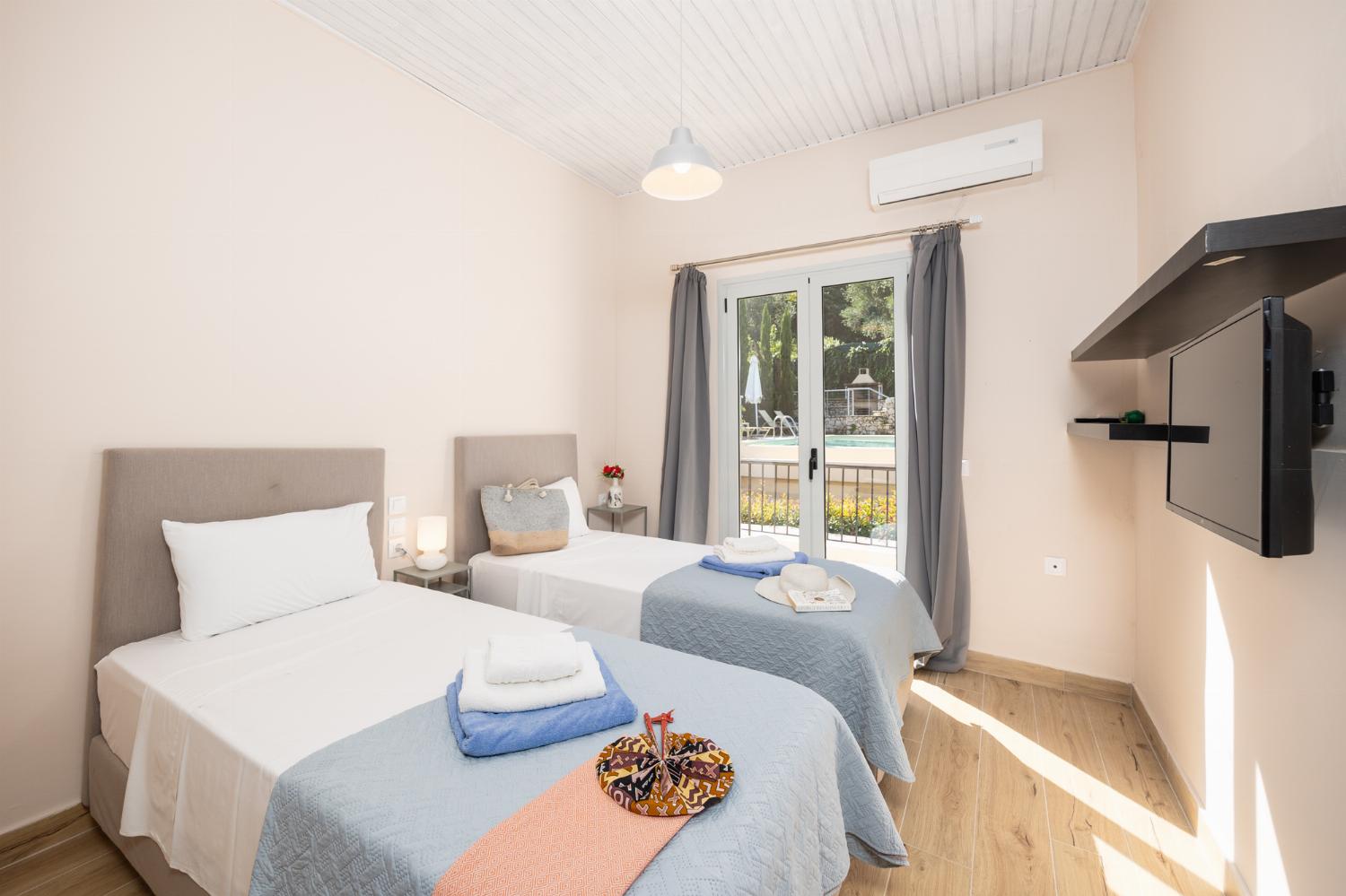 Twin bedroom with A/C