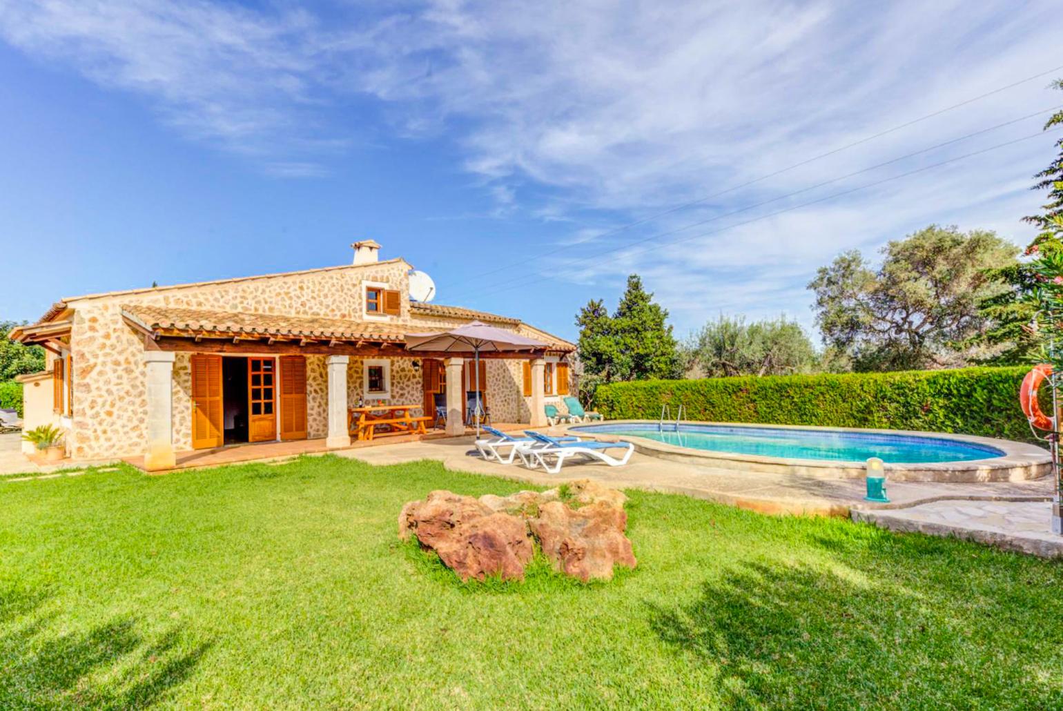 Beautiful villa with private pool, terrace, and lawn