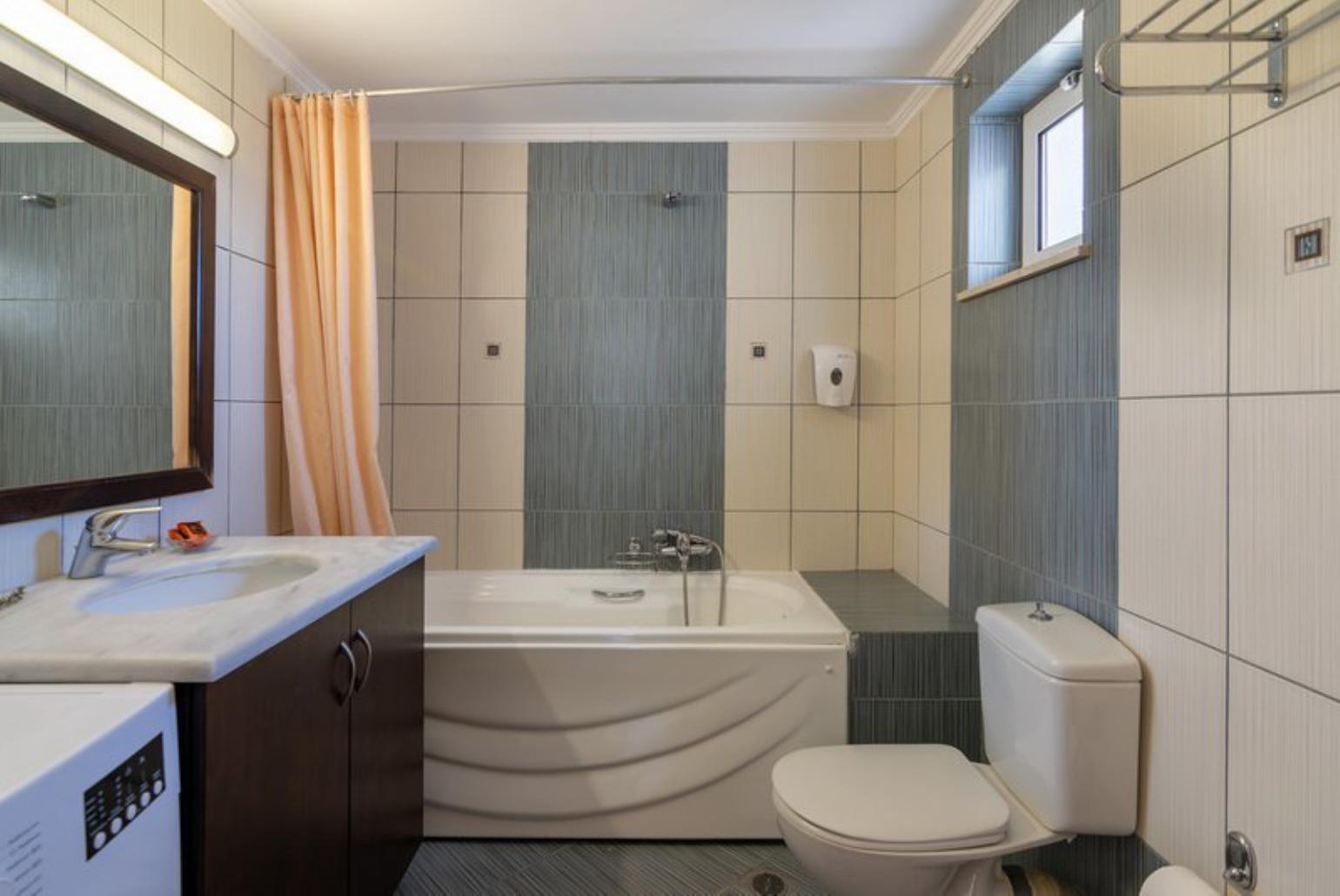 Bathroom with washing machine 