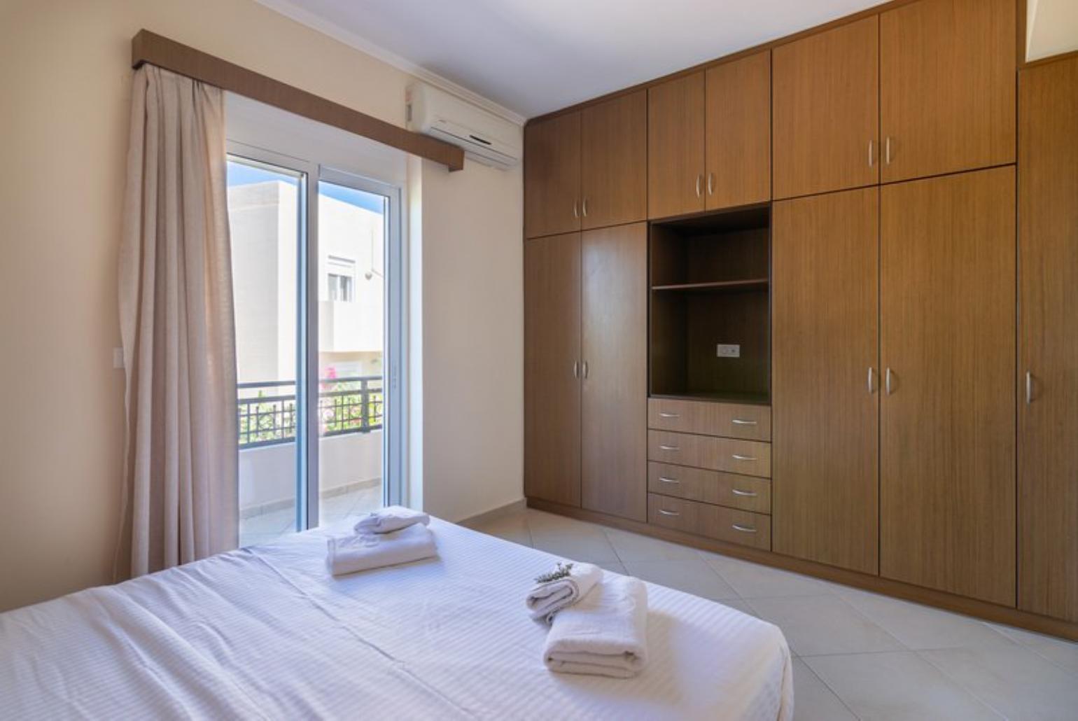 Double bedroom with balcony access