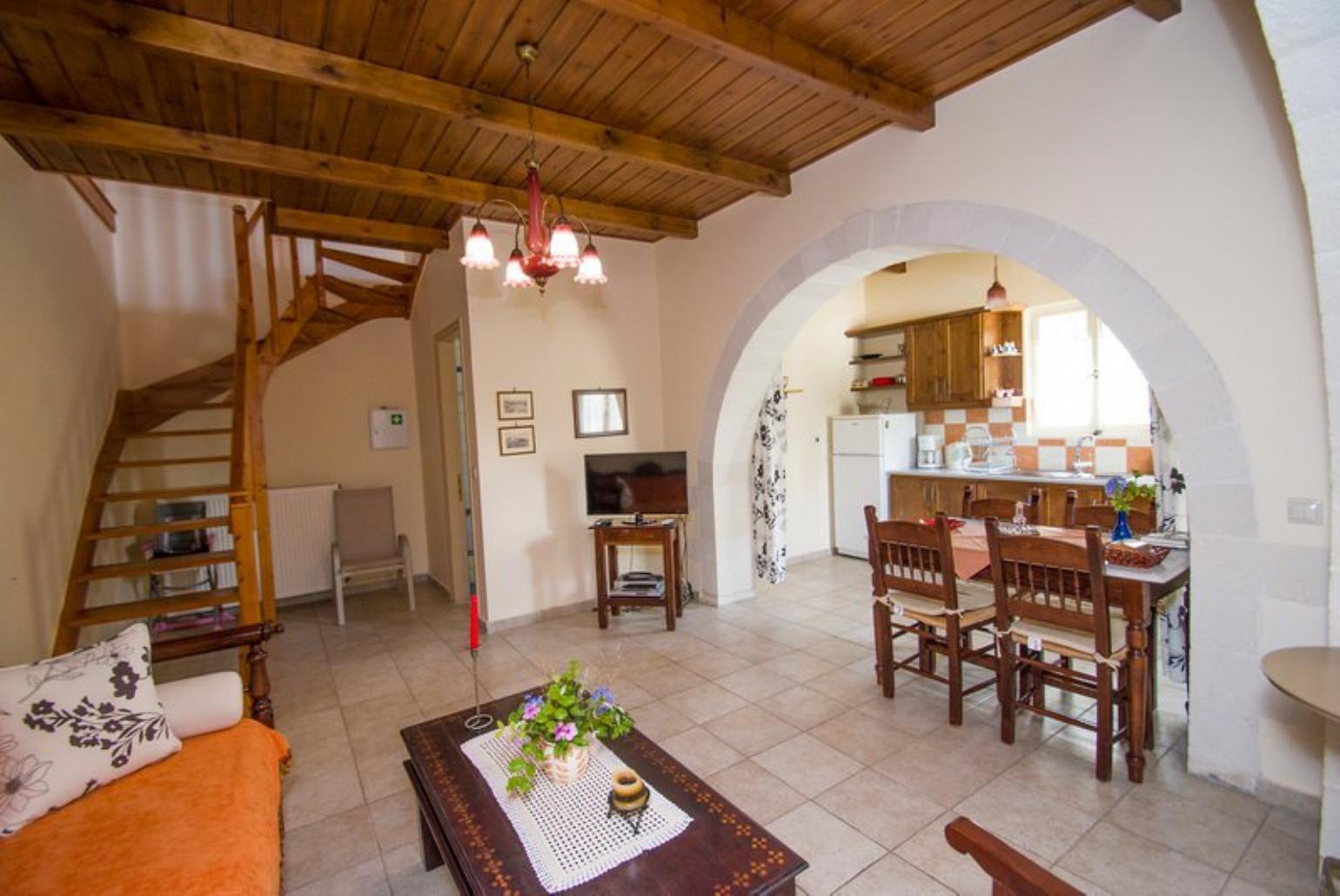 Living room with dining area and kitchen 