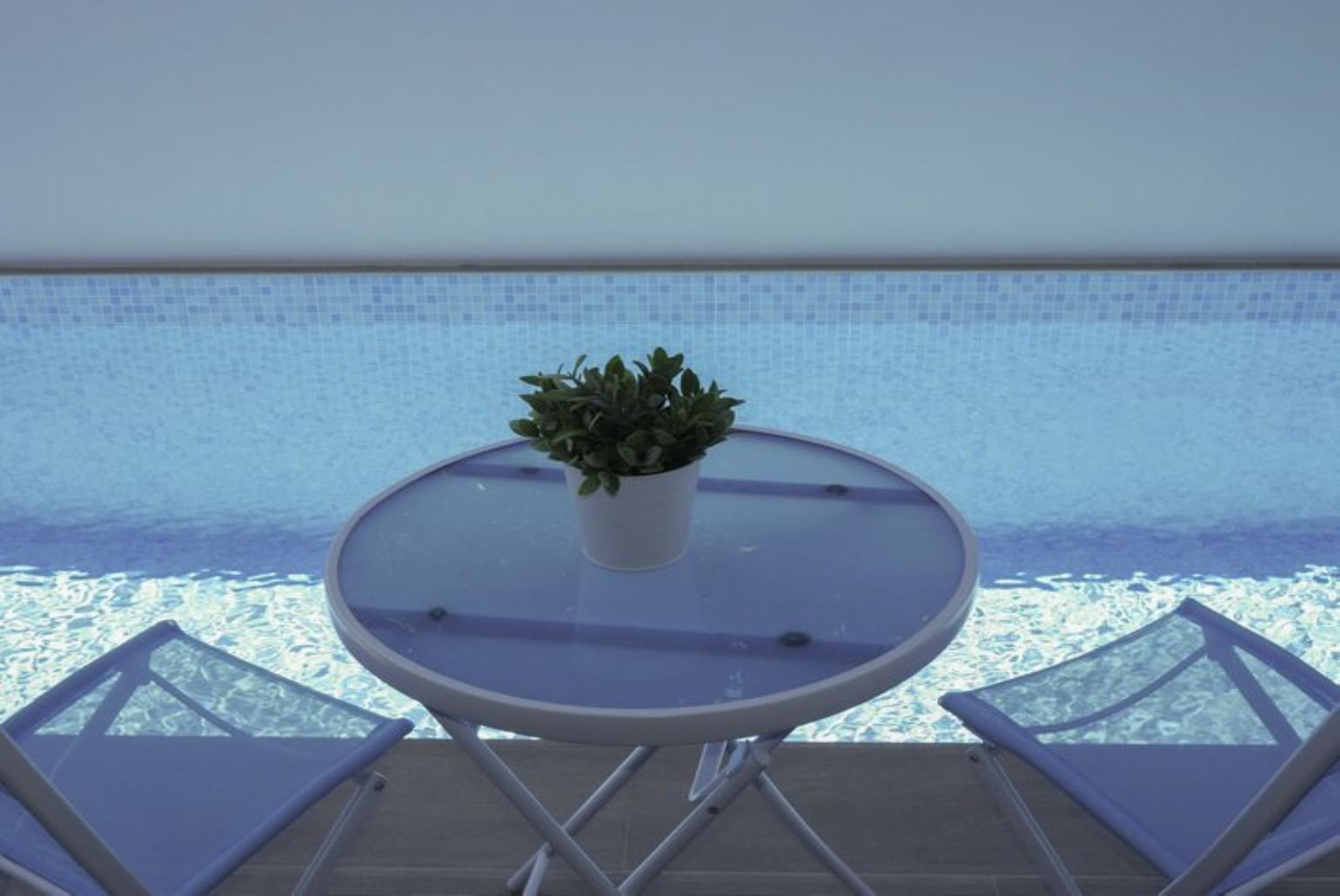 Coffee table with beautiful pool view.