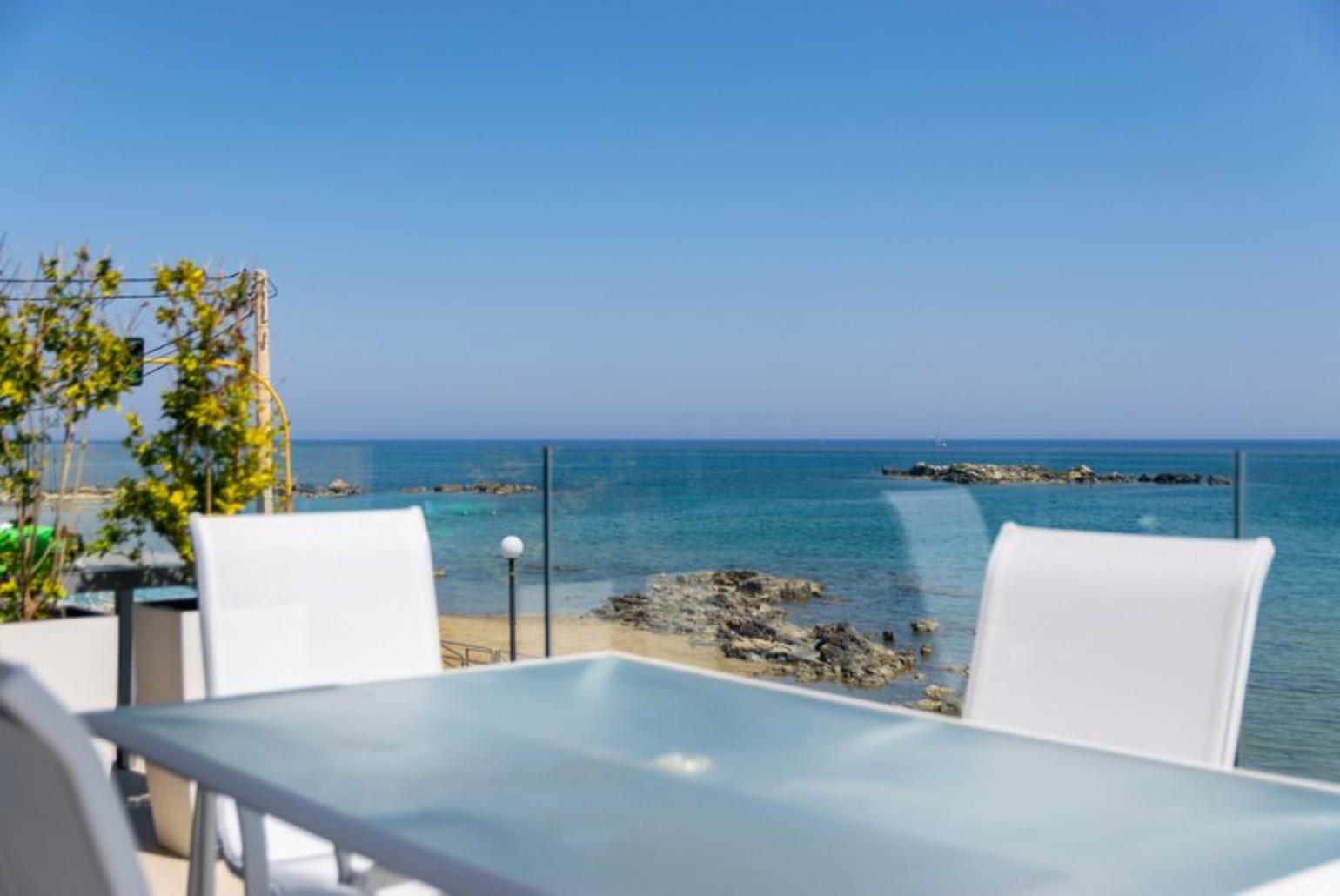 Beautiful terrace with sea view and  outdoor dining area