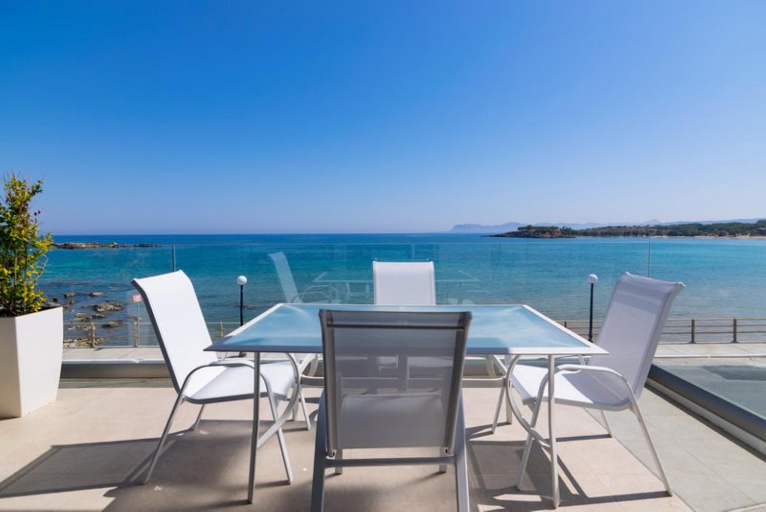 Beautiful terrace with sea view and  outdoor dining area