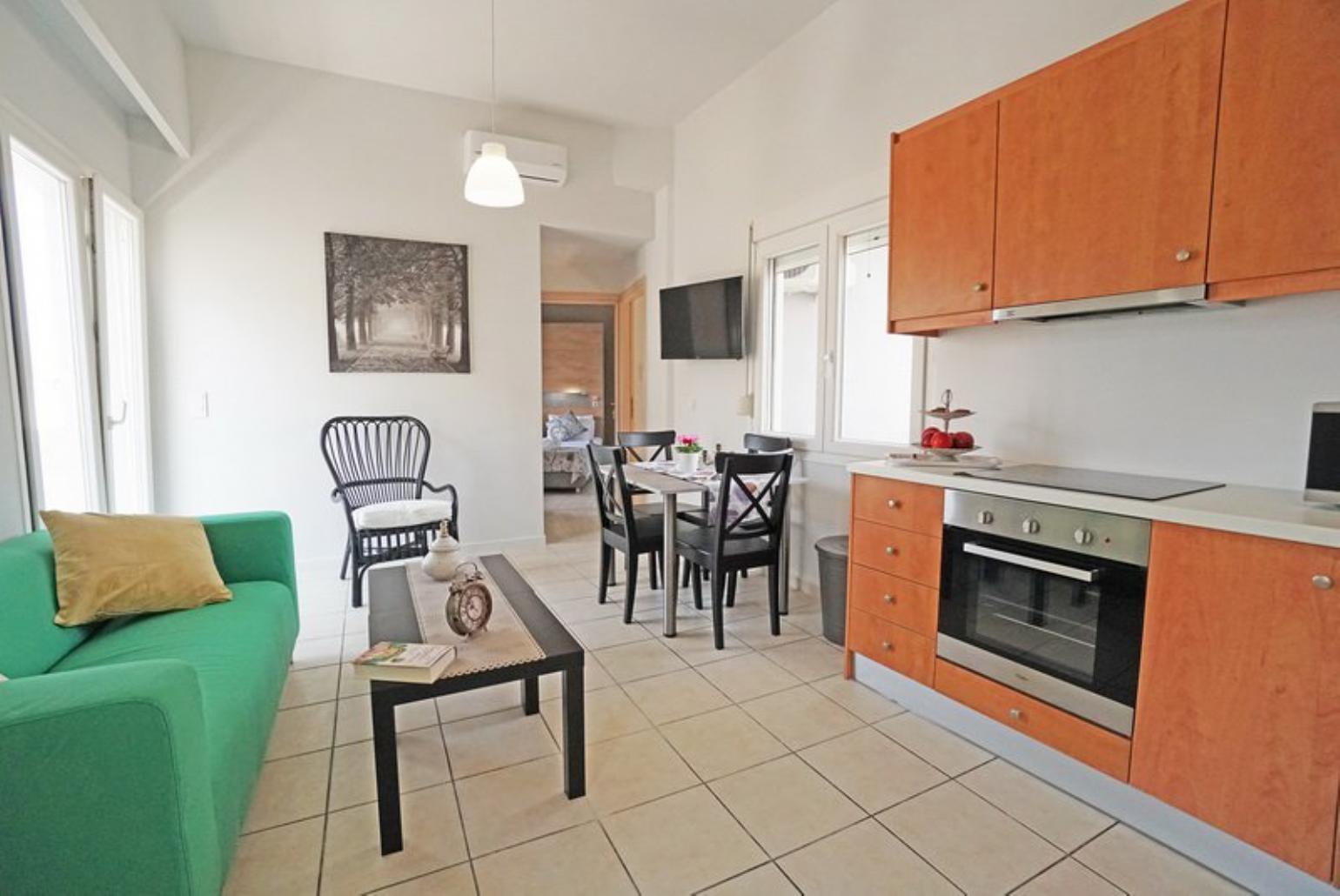 Open-concept living room with kitchen and dining area