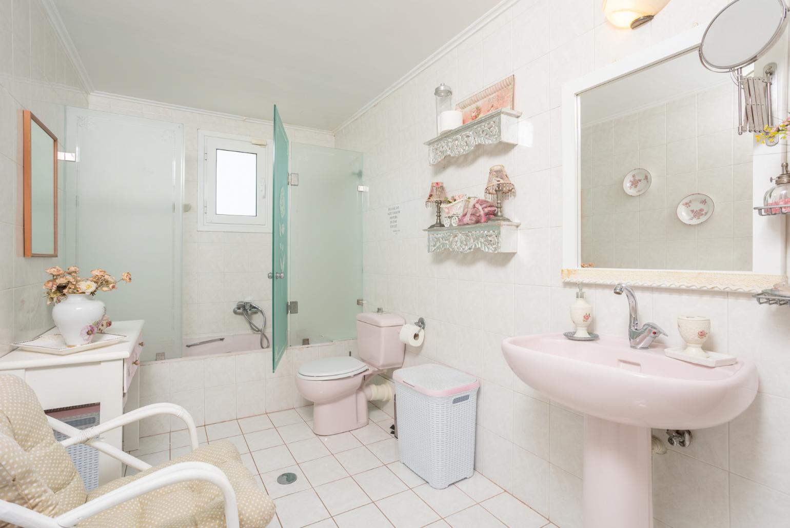 Family bathroom with bath and shower