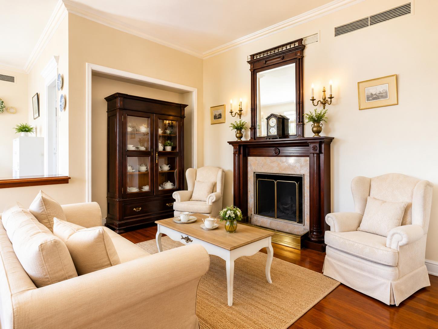 Living room with sofas, dining area, ornamental fireplace, WiFi internet, and satellite TV