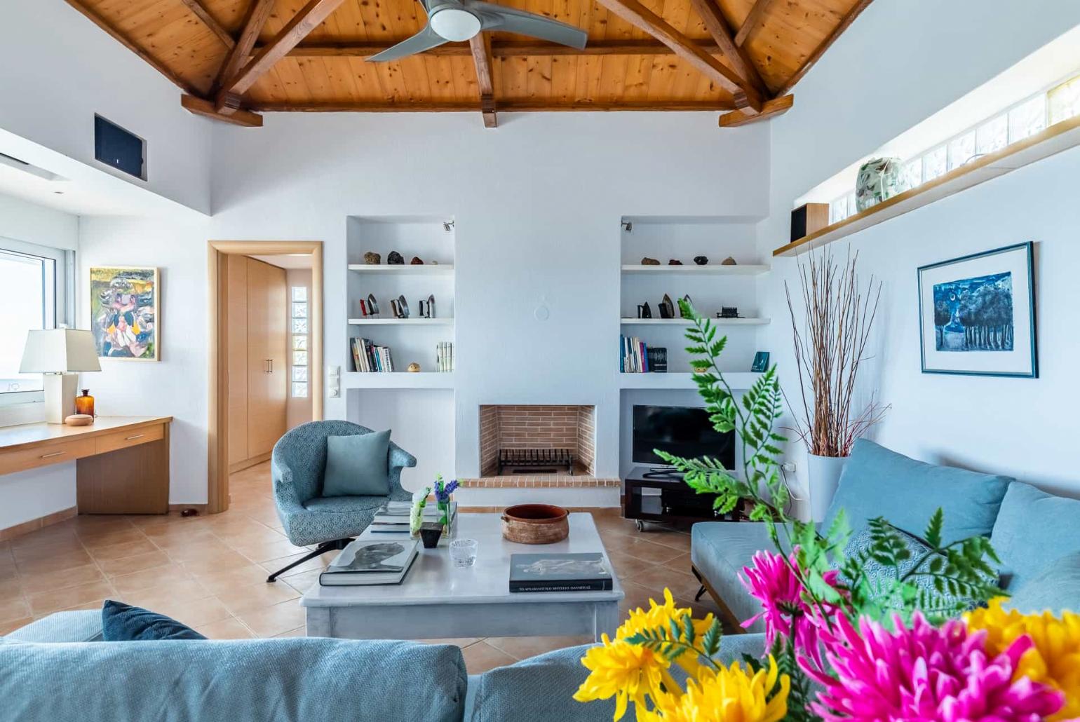 Living area with beautiful decor and TV 