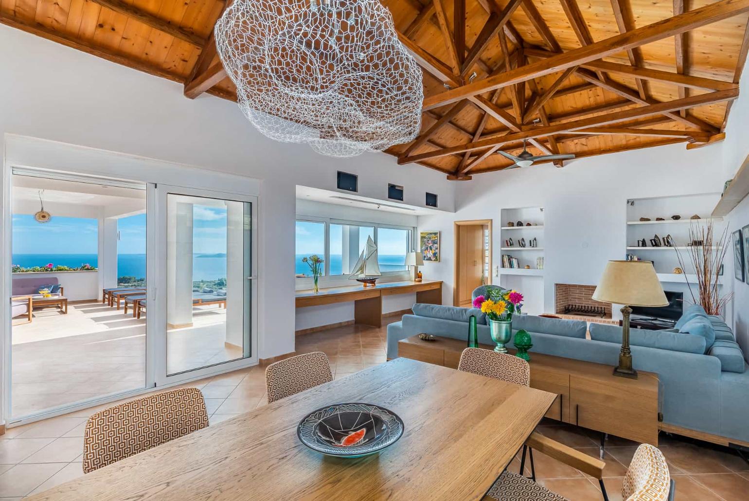 Living area with beautiful decor and indoor dining 