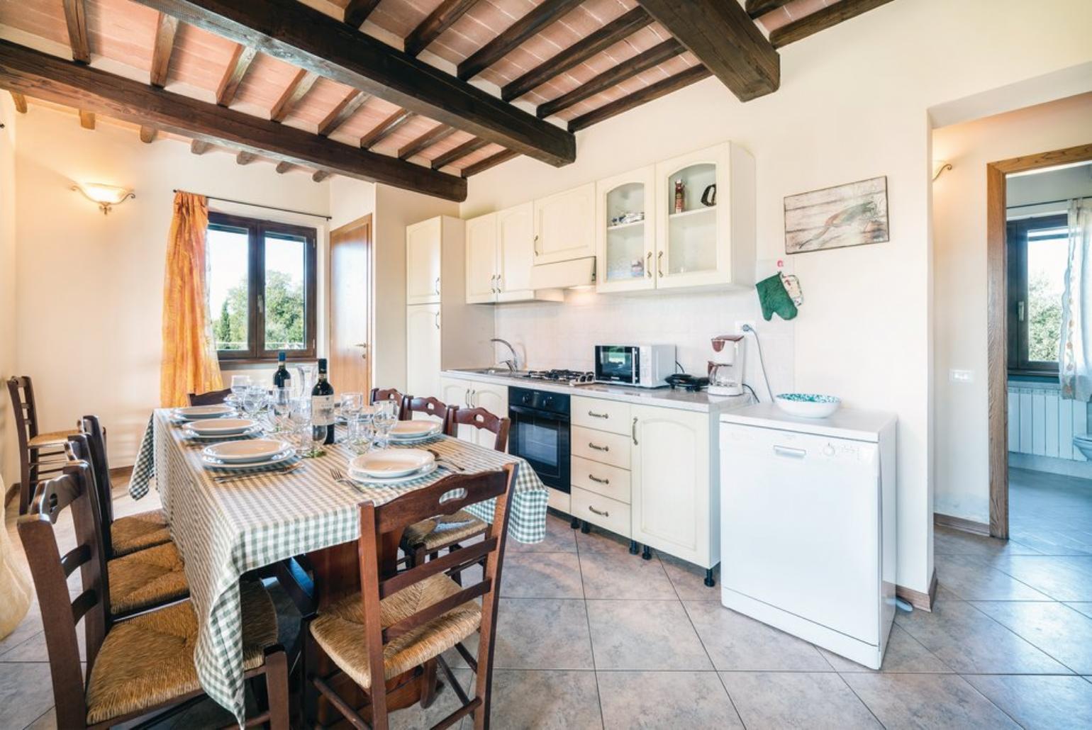  Equipped kitchen and open plan dining area.