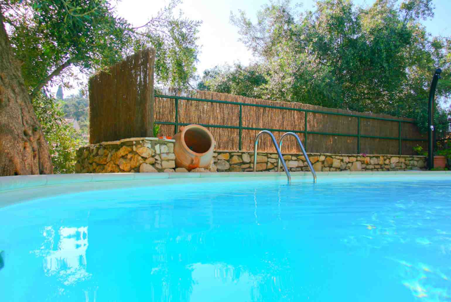 Private swimming pool with terrace area