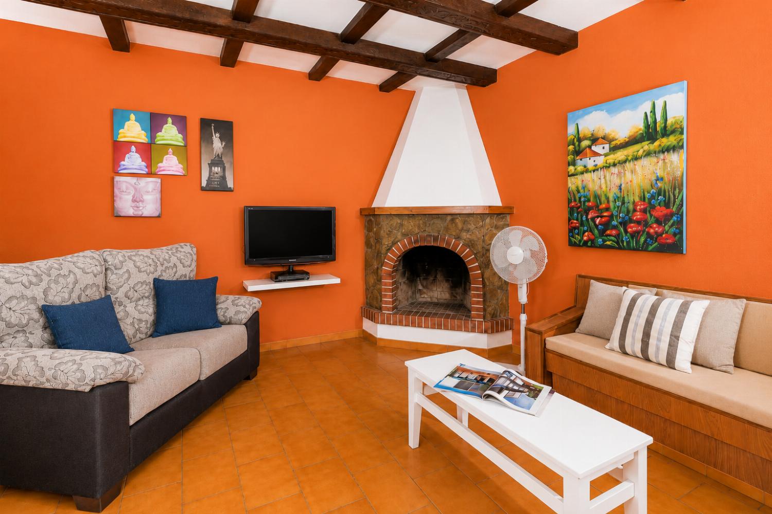 Open plan living room with WiFi Internet, Satellite TV, and Ornamental Fireplace