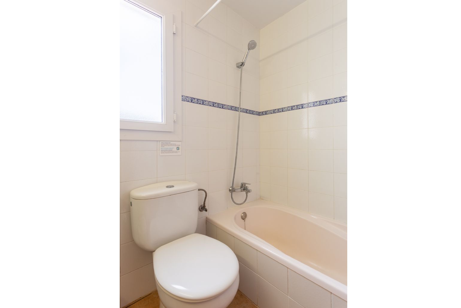 Family bathroom with bath and shower