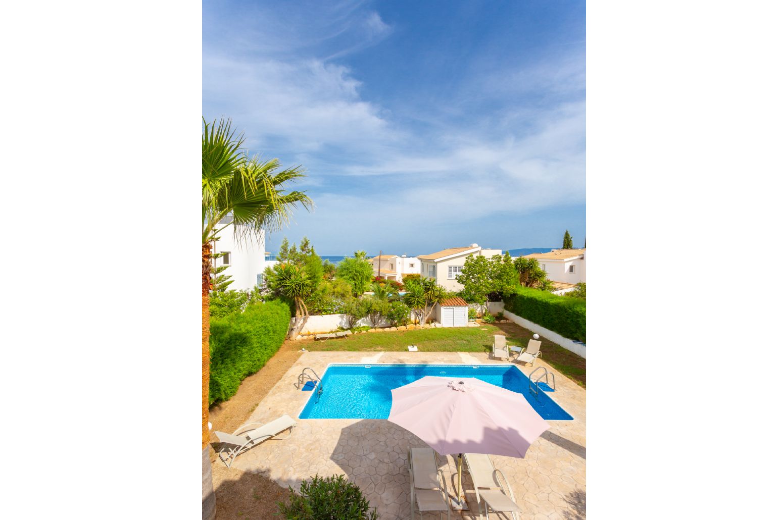 View of pool terrace from upper terrace