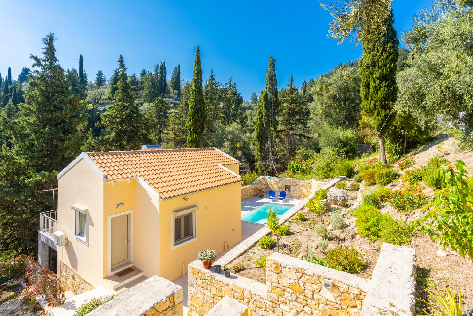 ,Beautiful villa with private pool and terrace with woodland views