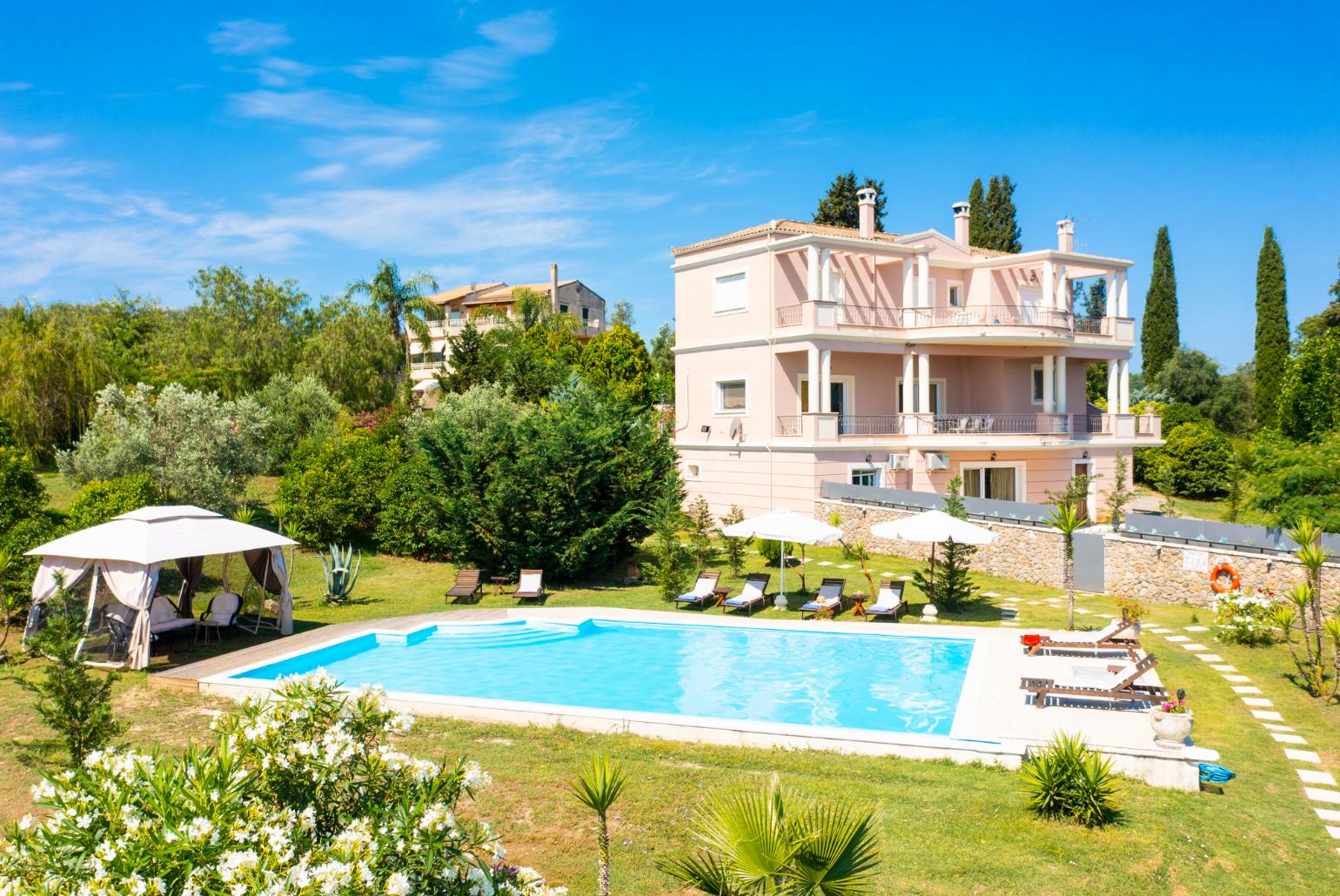 ,Beautiful villa with private pool, terraces, and garden