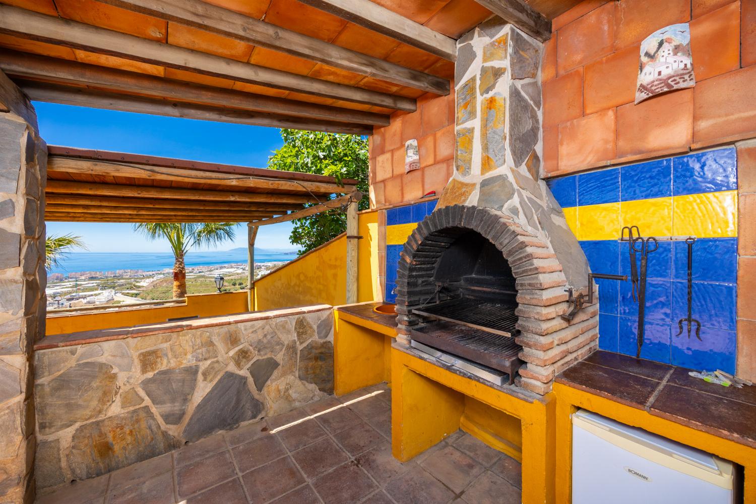 Sheltered terrace area with BBQ