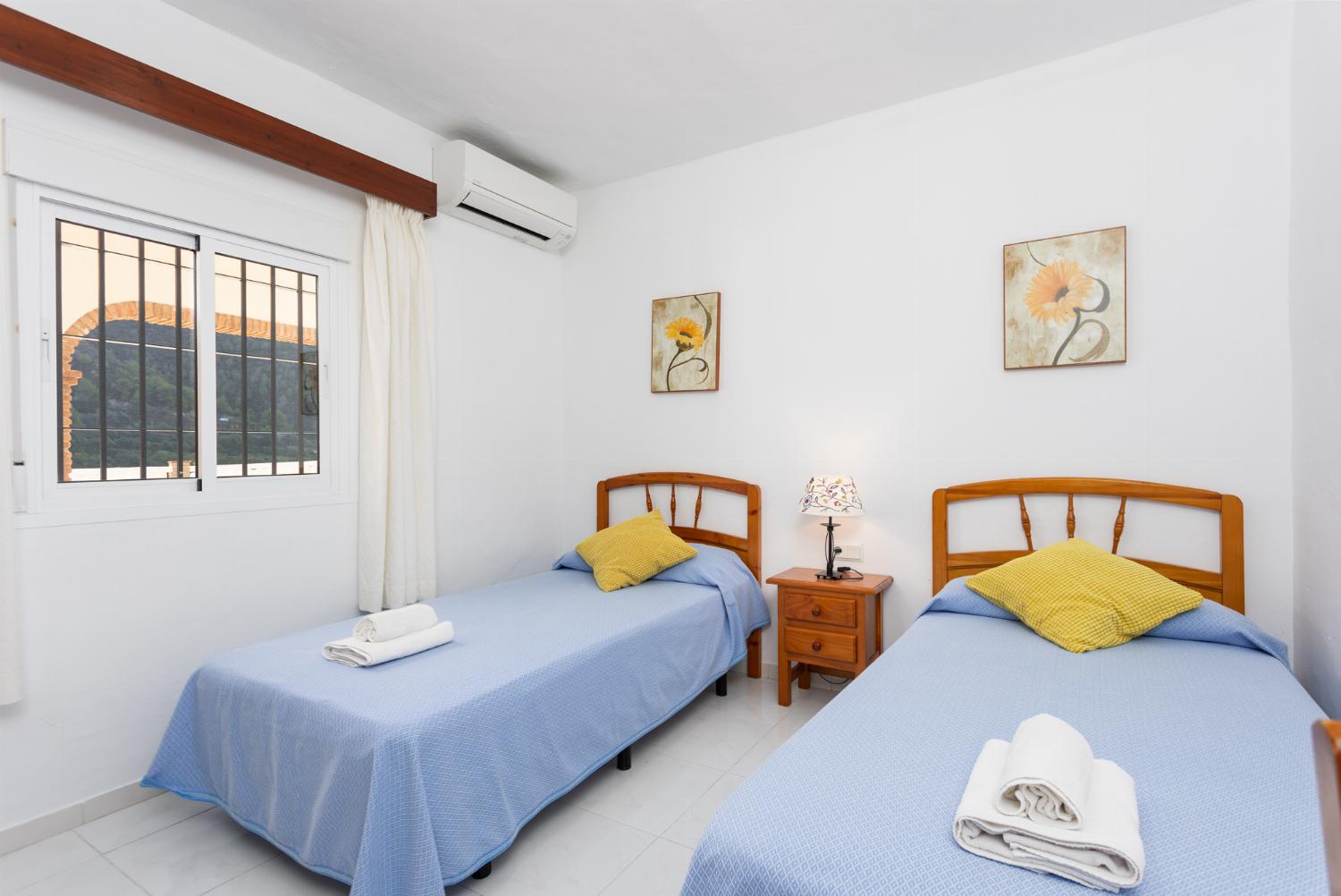 Twin bedroom with A/C