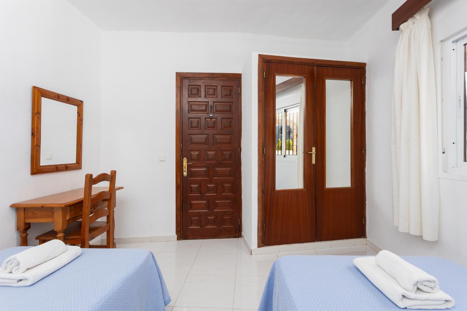 Twin bedroom with A/C