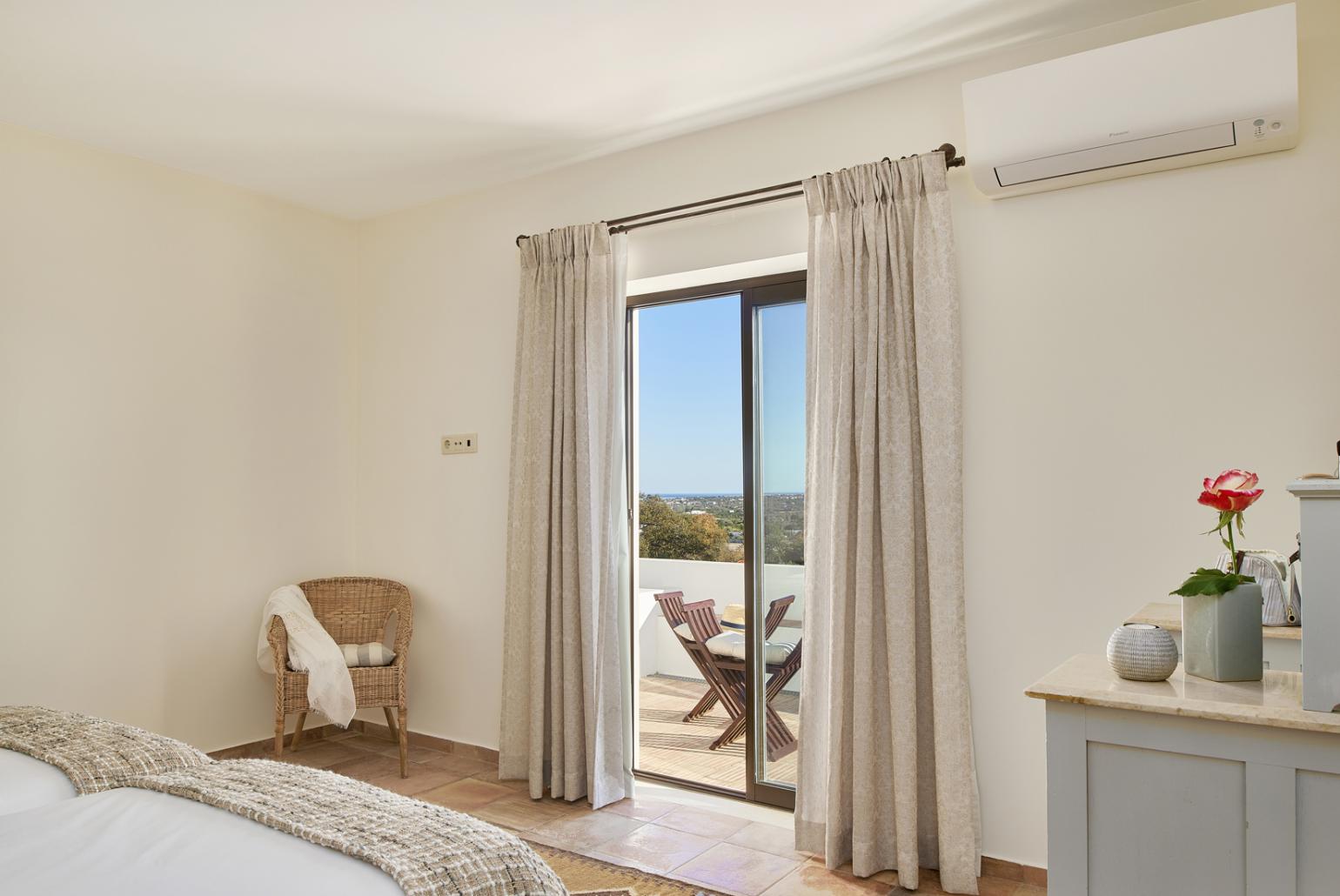 Double bedroom with A/C,  access to balcony