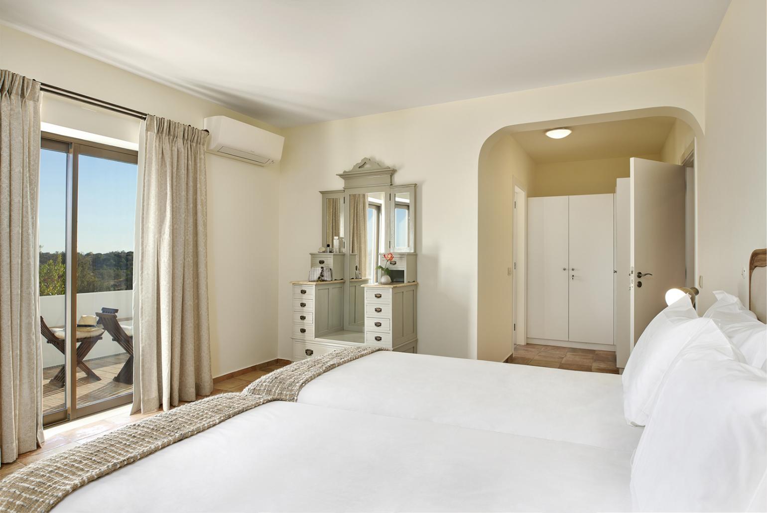 Double bedroom with A/C and access to ba;cony