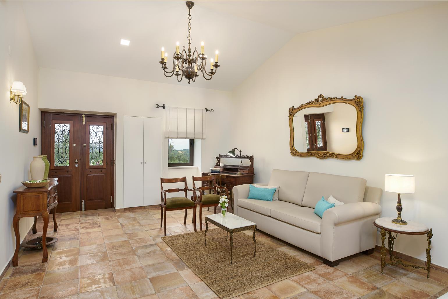 Open-plan living room with sofa, dining area, kitchen, WiFi internet, satellite TV, and sea views