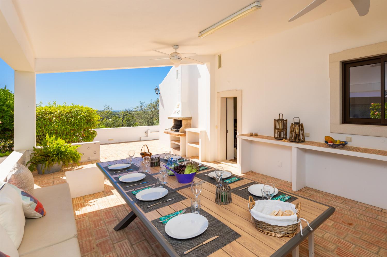 Sheltered terrace area with BBQ