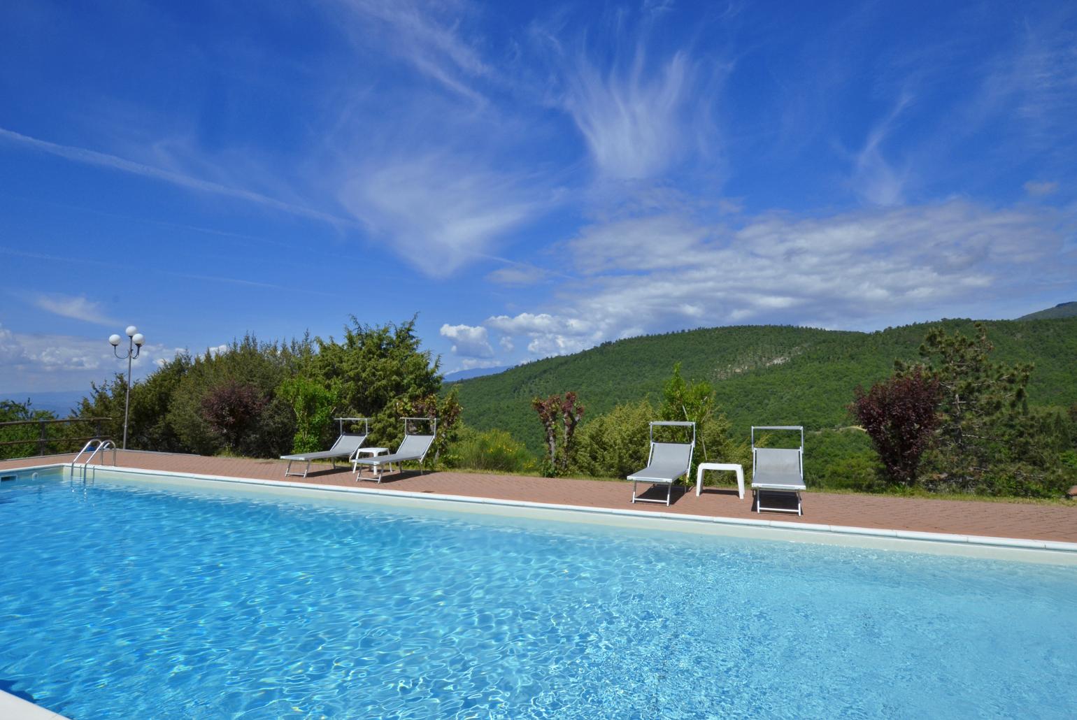 Private pool, terrace, and garden with countryside views