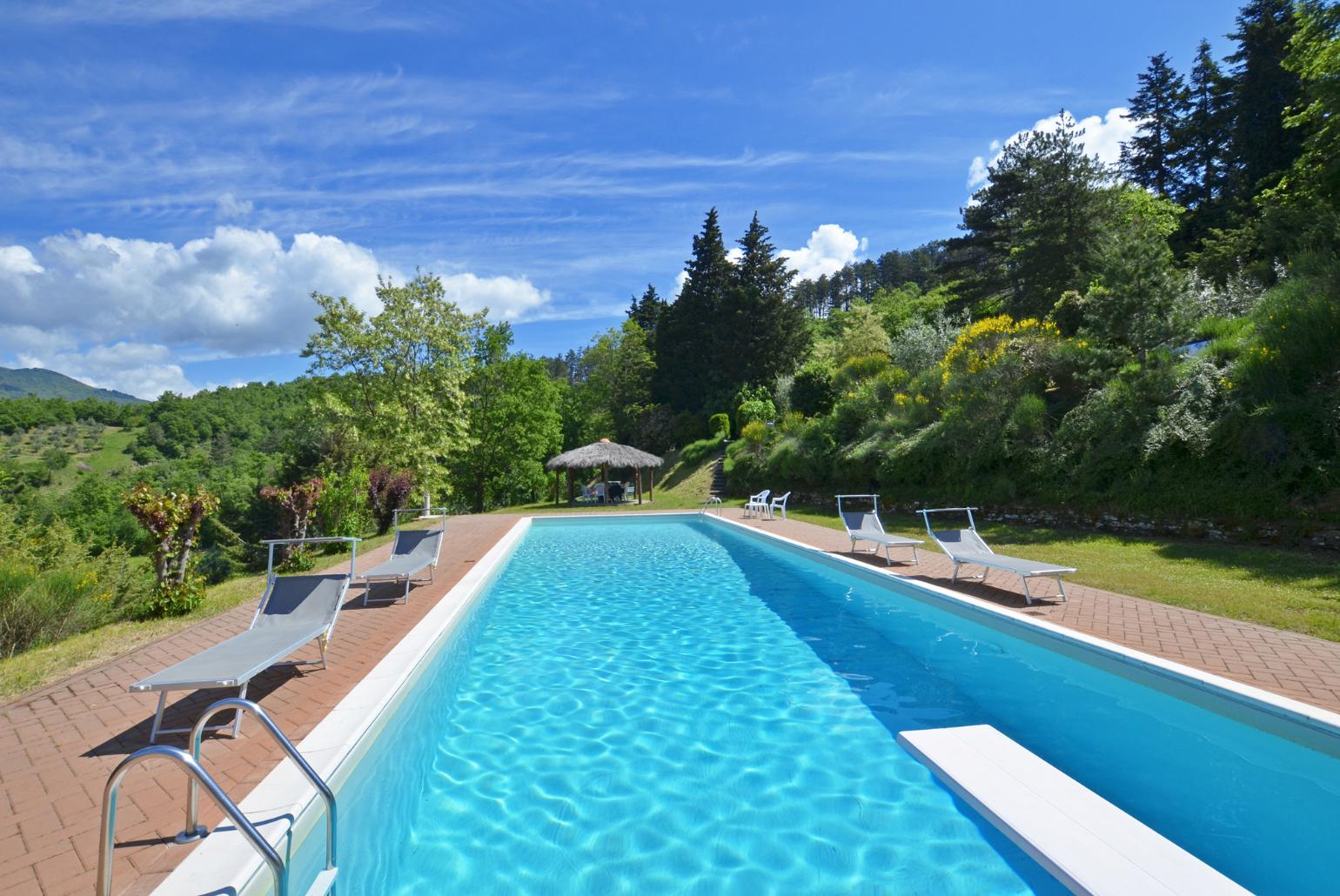 Private pool, terrace, and garden with countryside views