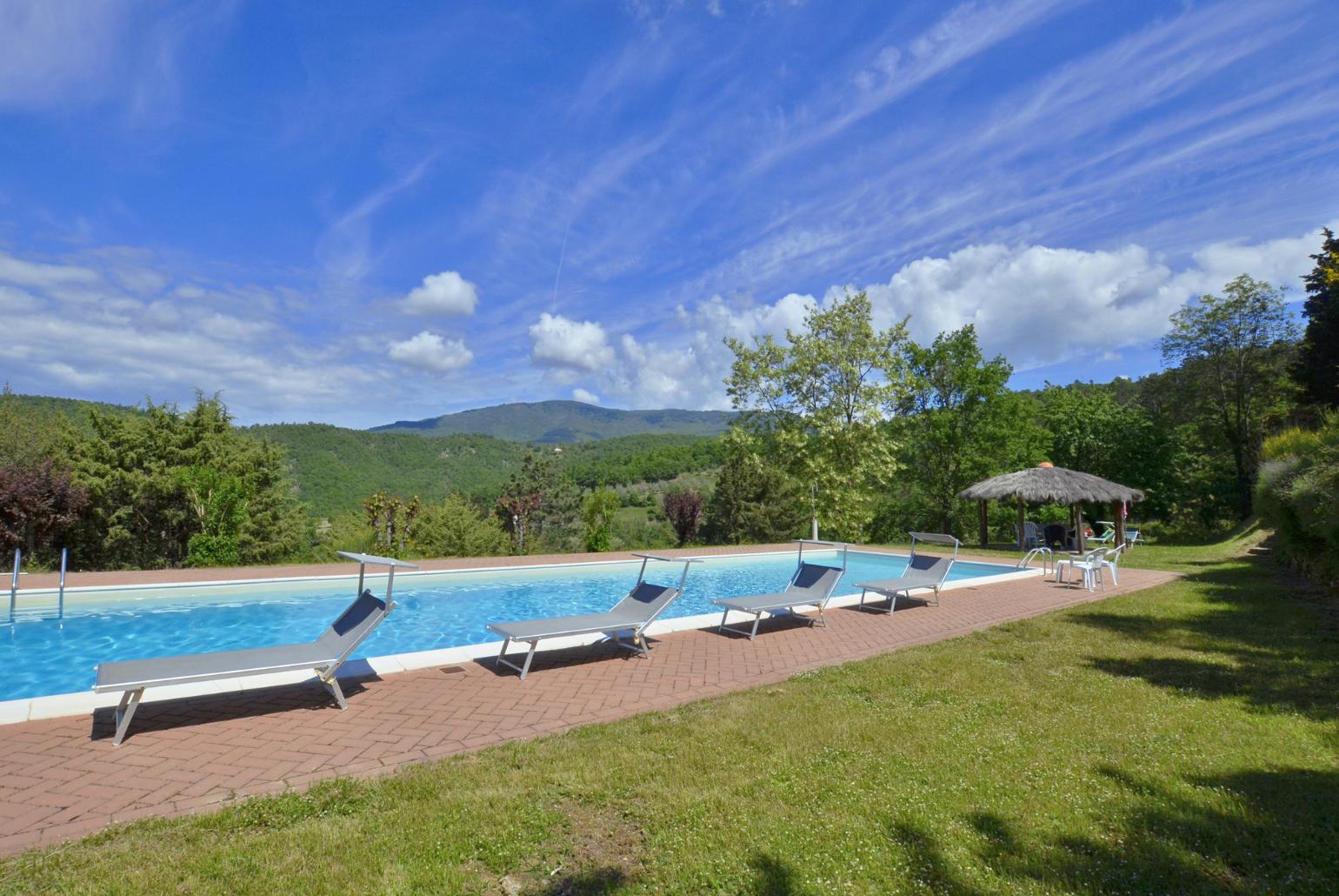 Private pool, terrace, and garden with countryside views