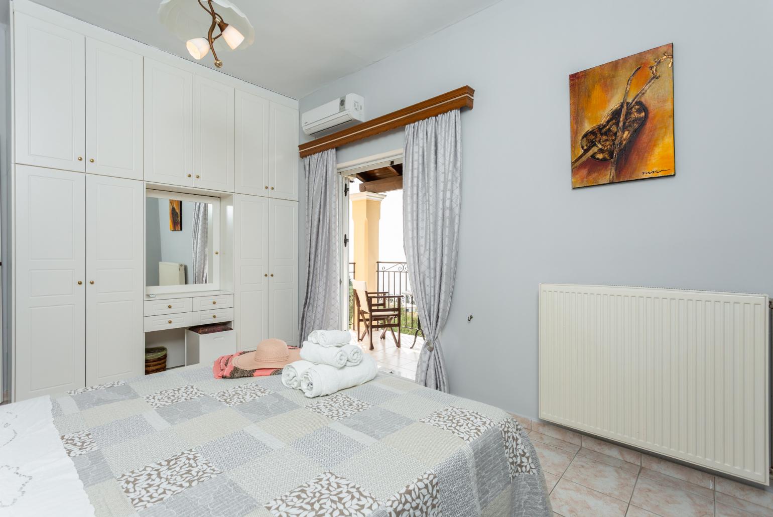 Double bedroom with A/C and balcony with sea views