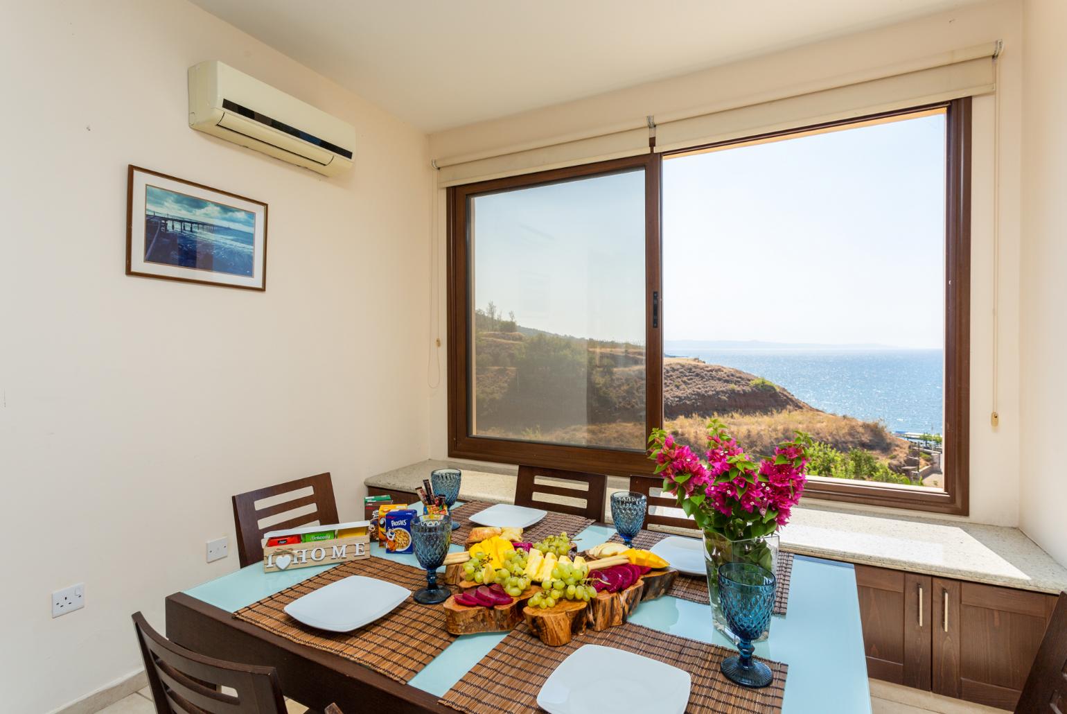 Dining area with A/C and sea views