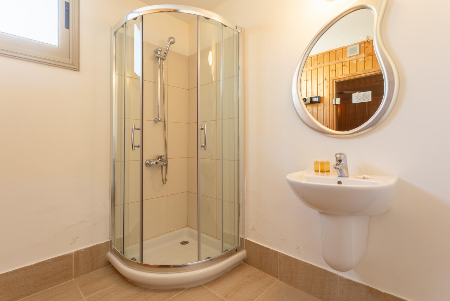 Family bathroom with shower and sauna