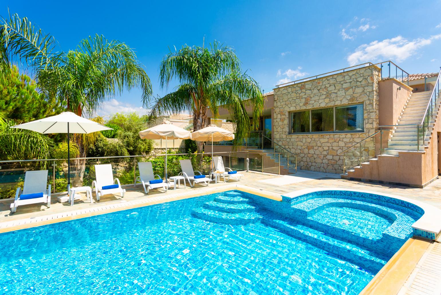 Beautiful villa with private infinity pool, terrace, and garden with sea views