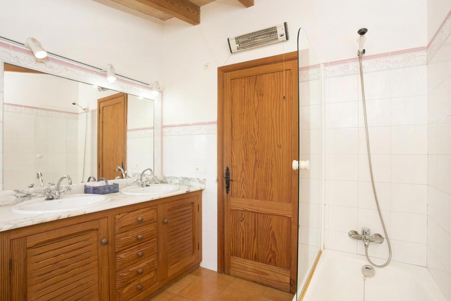 Family bathroom with bath and shower