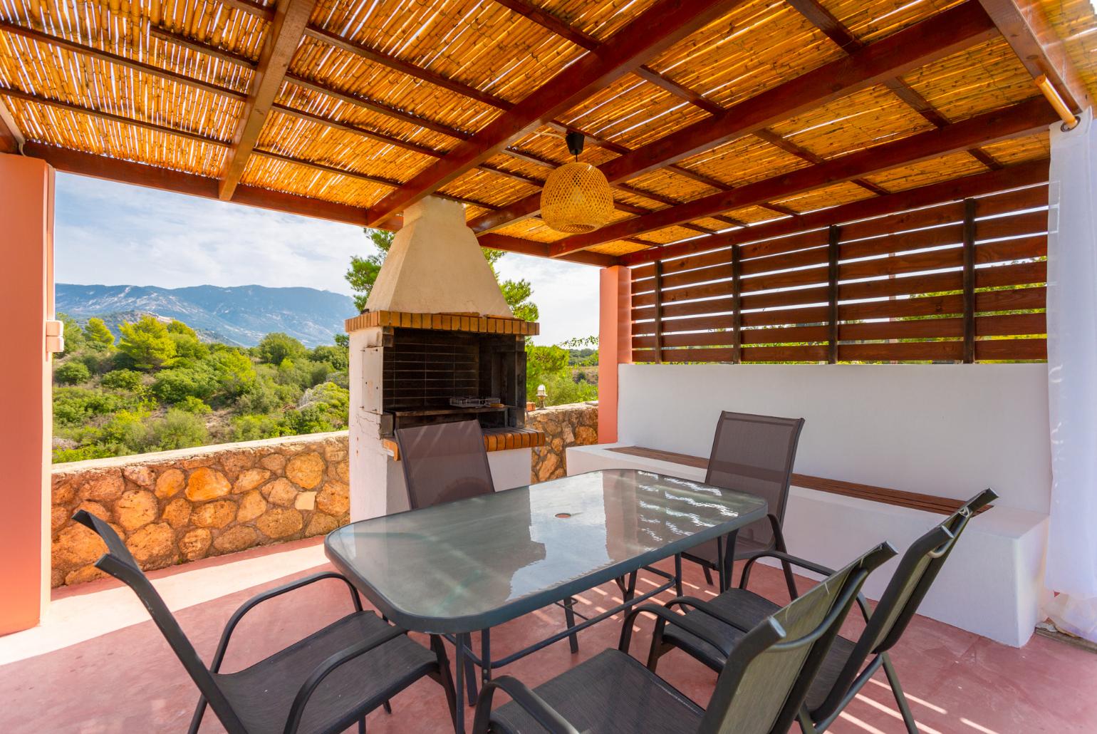 Sheltered terrace area with BBQ