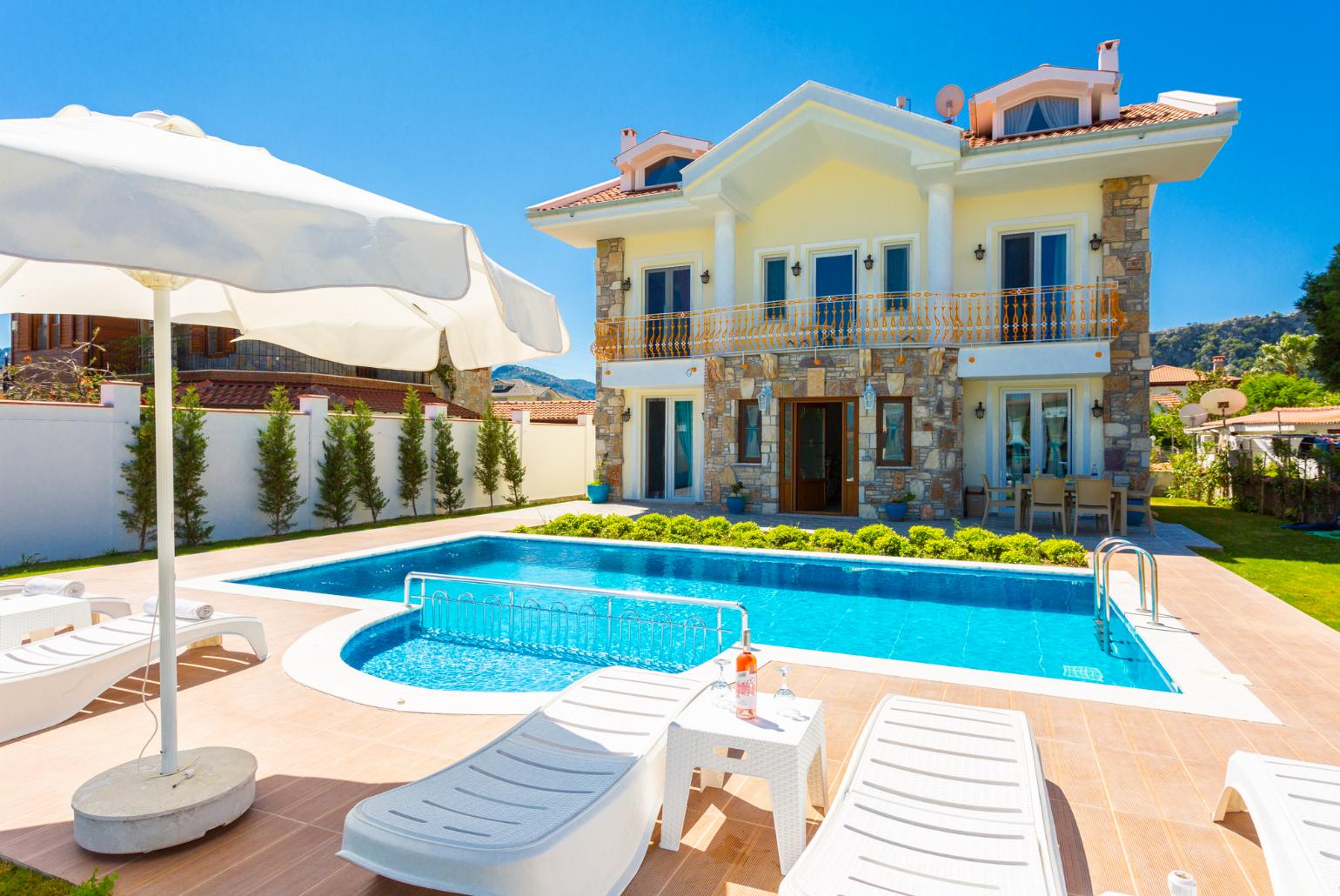 ,Beautiful villa with private pool, terrace, and garden