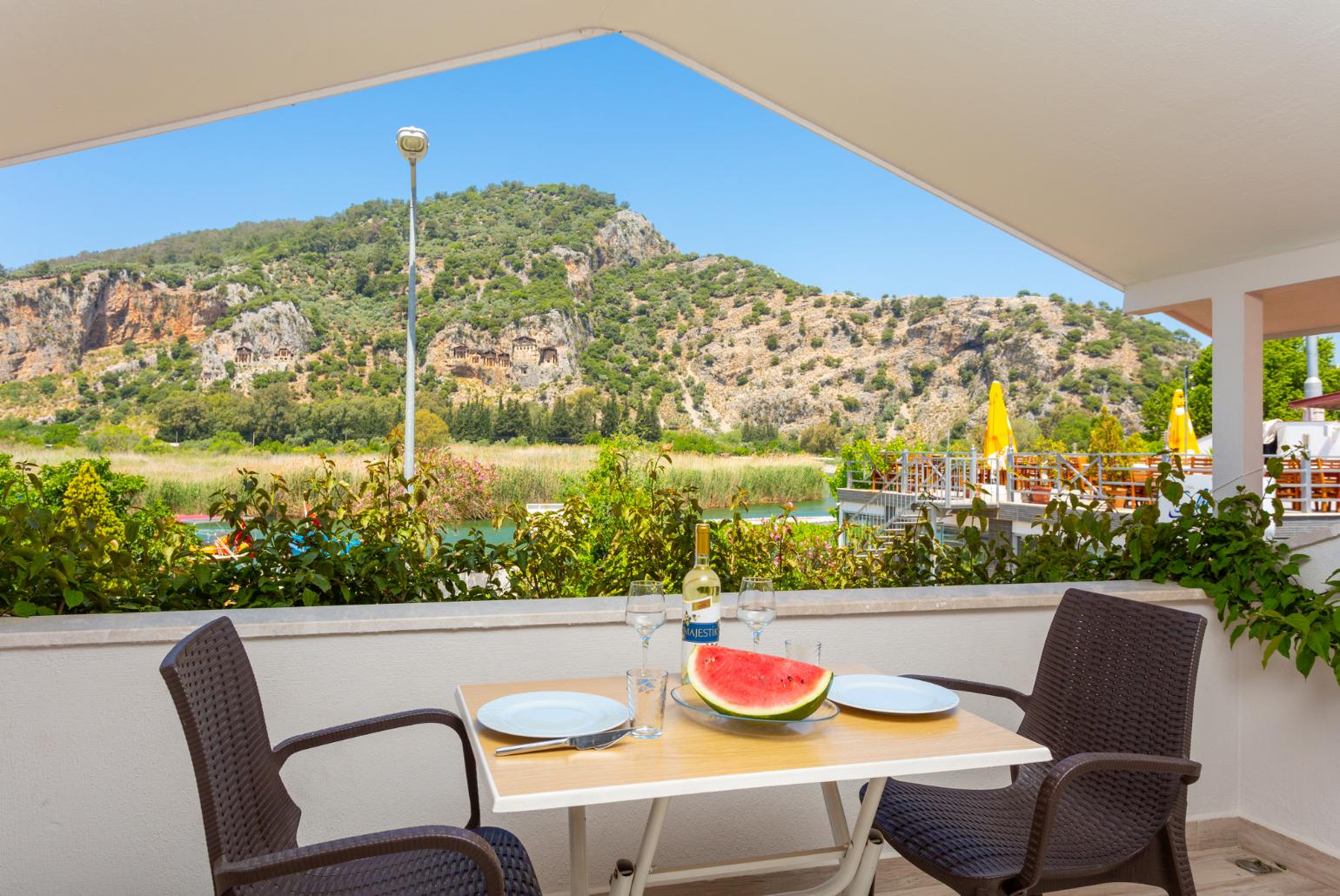 Upper sheltered terrace area with views of Dalyan river and the ancient Lycian rock tombs